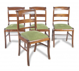 1231.  Juego de cuatro sillas de madera de nogal.España, S. XIX.