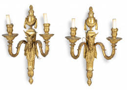 592.  Pareja de apliques Luis XVI de bronce dorado de dos luces.Francia, S. XIX.
