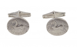 481.  Gemelos HERMES en metal plateado con caballos en relieve en círculo principal