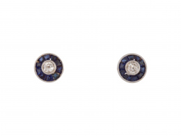 107.  Pendientes ojo de perdiz con un brillante orlado de zafiros 