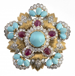 425.  Broche de turquesas, rubíes y brillantes con diseño de gran flor, años 60 