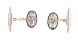 77.  Gemelos Art-Decó ovales calados con brillante central y zafiros calibrados