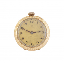 440.  Reloj colgante OMEGA años 20 en oro amarillo de 18K