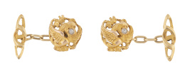 97.  Gemelos circulares Art-Nouveau con figura de grifo en relieve decorada con un chatón de brillante en el centro