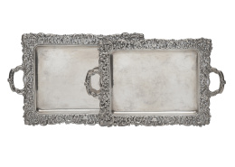 595.  Juego de dos bandejas de plata de diferente tamaño. Con marcas. Comercializadas por Agüera, 9.Dionisio García, h. 1940.