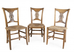 674.  Juego de siete sillas con asiento de enea de estilo imperio.Francia, S. XIX.