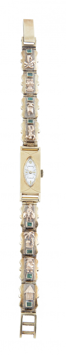 456.  Reloj TRESSA incabloc años 60, con pulsera decorado con motivos precolombinos y esmeraldas.
