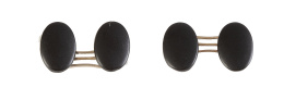 431.  Gemelos dobles S. XIX con piezas ovales de azabache mate 