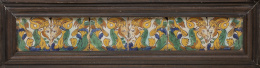 1072.  Panel de seis azulejos de céramica esmaltada con cabezas de carneros afrontadas y hojas, esmaltado en verde, amarillo y azul.Sevilla. S. XVI.