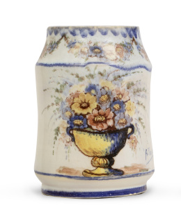 1310.  Antonio Peyró (Onda 1881- Valencia 1954).Bote de cerámica esmaltada con flores. Firmado.