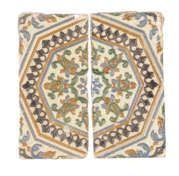 1212.  Dos azulejos de  tabla cerámica esmaltada de arista con flores.Toledo, S. XVII.