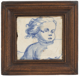 545.  Azulejo de cerámica esmaltada en azul y blanco con cabeza de "putti".Delft, S. XVIII.