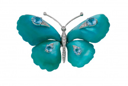 397.  Broche mariposa con brillantes y topacios azules sobre alas de madreperla color turquesa