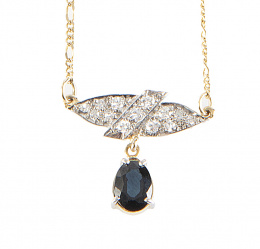227.  Pendentif con placa ojival de brillantes y zafiro de talla oval colgante