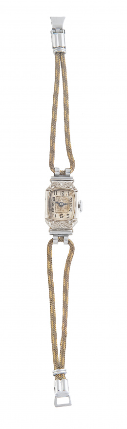 446.  Reloj de pulsera de señora Art-Decó en platino con diamantes