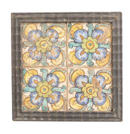 505.  Panel de cuatro azulejos de cerámica esmaltada con flores, en azul, verde y ocre.Valencia, S. XVIII.