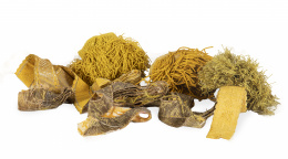 1300.  Lote de diez piezas de tela para aplicación en amarillo e hilos dorados.Trabajo español, S. XVIII - XIX.