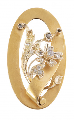 26.  Broche oval S. XIX con flor de diamantes rodeada por cinta oval en oro mate