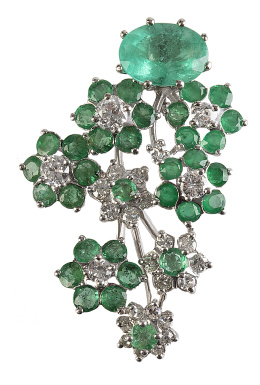 318.  Broche de brillantes y esmeraldas con diseño de ramo de flores