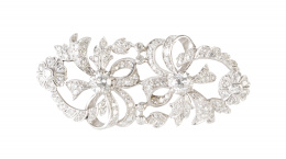 278.  Broche placa años 50 con doble motivos de lazos y flores