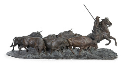 652.  Mariano Benlliure Gil (1862 - 1947)."Camino de encierro" o "Encierro de una corrida".Grupo escultórico de bronce.Sobre base de madera.