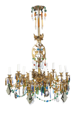 615.  Lámpara de techo de doce brazos de luz de bronce dorado y cristal transparente y de colores.Murano, pp. del S. XX.