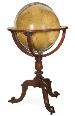 1220.  Globo terráqueo sobre pie de trípode de madera tallada con ruedas.Editado por Cruchley´s*, Londres, h. 1865.