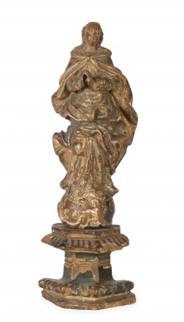 1177.  “Inmaculada”.
Escultura de madera tallada con restos de pol