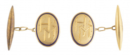110.  Gemelos de pp. S. XX con iniciales y marco de esmalte azul
