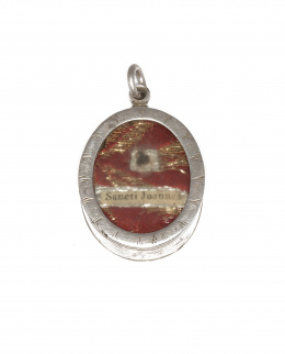 457.  Medallón relicario ovalado de plata, con reliquia de San Juana .España, ff. s.XVII.