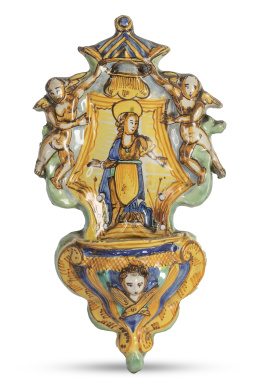 510.  Benditera de cerámica esmaltada en azul, verde y ocre.Cataluña, S. XVIII.