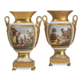 1149.  Pareja de ánforas Carlos X de porcelana esmaltada y dorada con escenas populares.París, primer cuarto del S. XIX.
