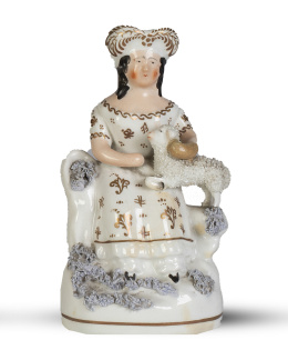 1200.  La Reina Victoria con oveja.Figura de loza esmaltada.Staffordshire, Inglaterra, S. XIX.