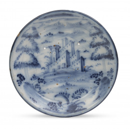 1197.  Plato de cerámica esmaltada en azul y blanco con arquitectu