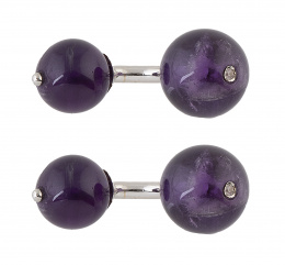 442.  Gemelos dobles con esferas de amatista, con un zafiro rosa en la de mayor tamaño