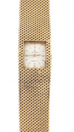 436.  Reloj OMEGA de señora años 60 en oro de 18K con pulsera de malla de oro 