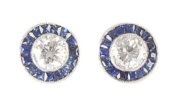 417.  Pendientes ojo de perdiz con brillantes de 0,30 ct aprox orlados de zafiros calibrados