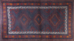 603.  Alfombra paquistaní en lana con campo azul y geométrica rom