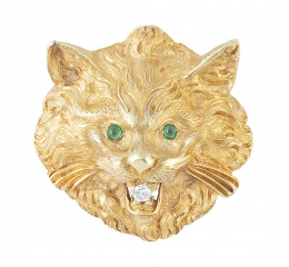 69.  Broche con diseño de cabeza de gato, decorada con cabuchone