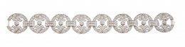407.  Pulsera de brillantes con ocho centros circulares calados articulados por dobles bandas de brillantes