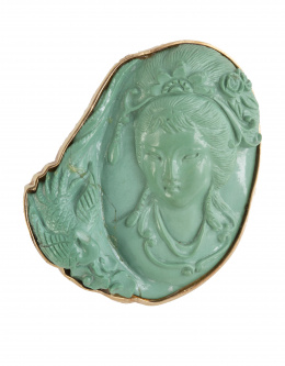 191.  Broche oriental años 60 con dama tallada en turquesa rodead