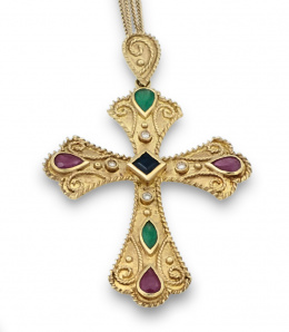 734.  Cruz colgante siguiendo modelos medievales, en oro de 18K con rubíes, esmeraldas, zafiros y diamantes.