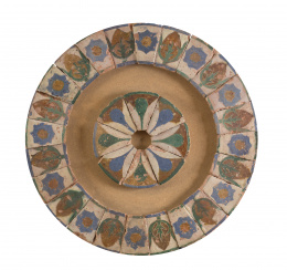 570.  Treinta y dos azulejos de cerámica esmaltada de “arista”, con flores.Teruel, S. XVI.