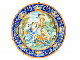 1243.  Plato en “maiolica” esmaltada con escena alegórica.Italia, S. XIX.