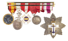 391.  Conjunto de condecoraciones en plata y plata vermeil 