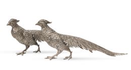 1259.  Pareja de faisanes decorativos de metal plateado.España, S. XX.