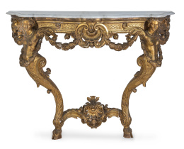 1224.  Consola regencia de madera tallada y dorada con tapa de mármol blanco.Trabajo francés, h. 1720.