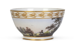 1221.  Cuenco de porcelana esmaltada de pasta dura y decoración pintada de escena bucólica.Firmado Pedro Giorgi (dorador) en la base en dorado y en rojo M bajo corona real.Buen Retiro, (1803-1808).