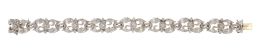 109.  Brazalete de brillantes y diamantes con ocho motivos florales articulados