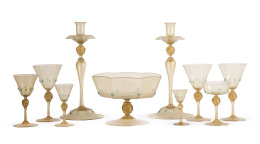 603.  Cristalería en vidrio a  la "façon de Venice" en color ámbar.ff. del S. XIX - pp. del S. XX.